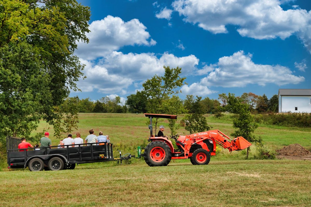A hay ride during American Jewell Realty's annual Farm Day